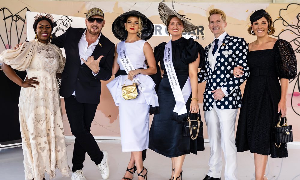 Derby Day Fashions on the Field winners in classic black and white outfits with statement hats and headpieces