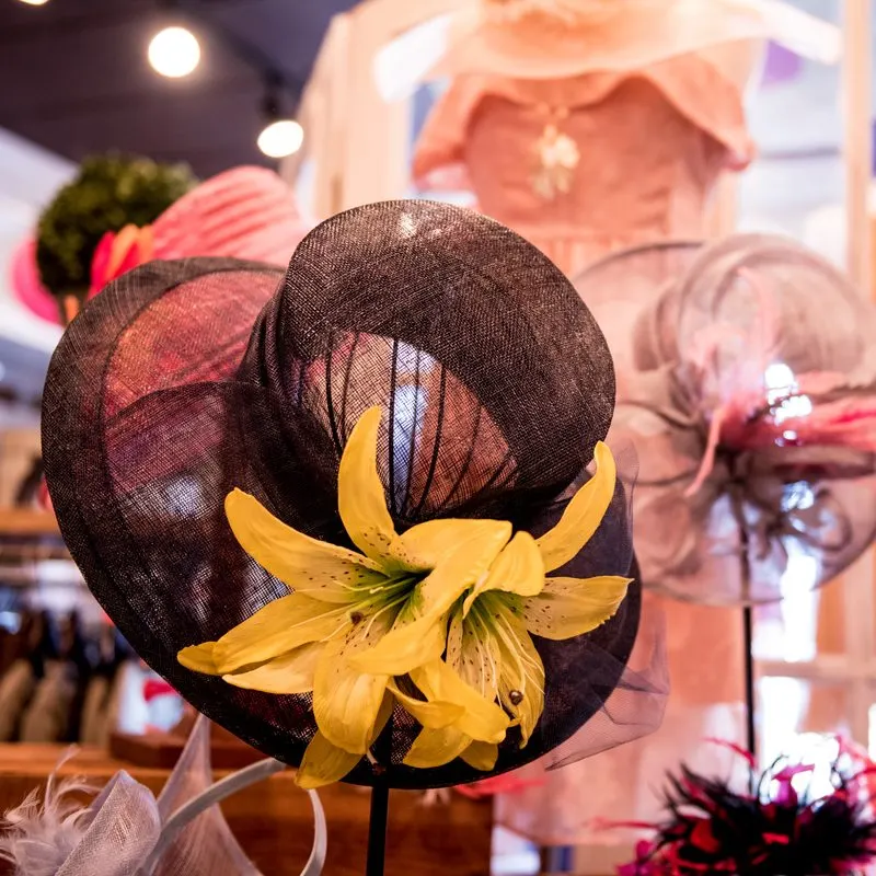 Traditional oversized and colourful Kentucky Derby hats on display at Churchill Downs