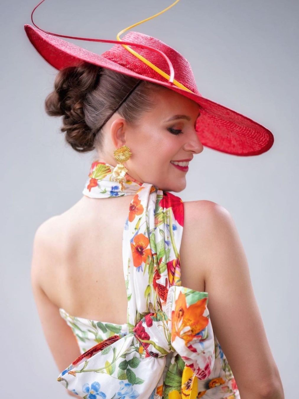 Client wearing Kathryn Lee Millinery fascinator at spring racing - social media gallery