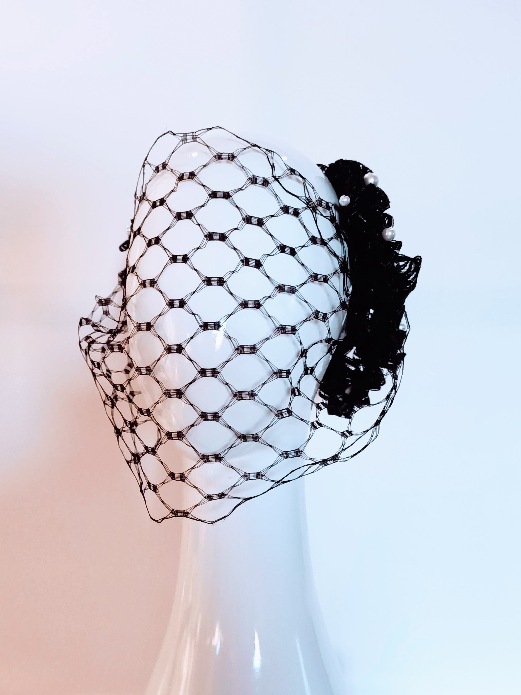 Charlotte headpiece from the Kathryn Lee Millinery collection featuring pearl