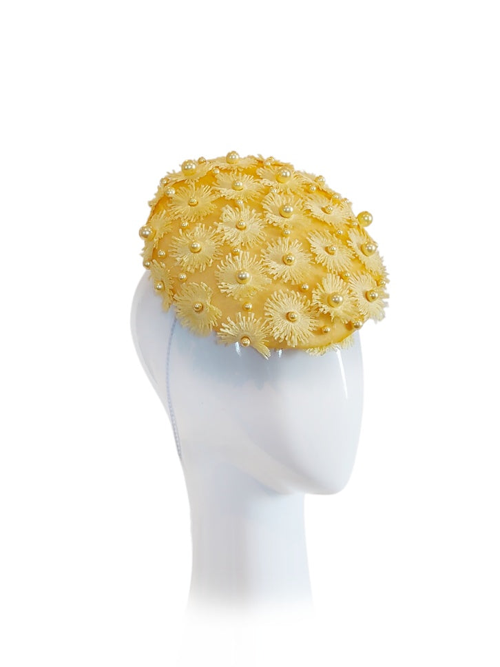Daisy handcrafted cap crafted from pearl – perfect for fashions on the field and Kentucky Derby