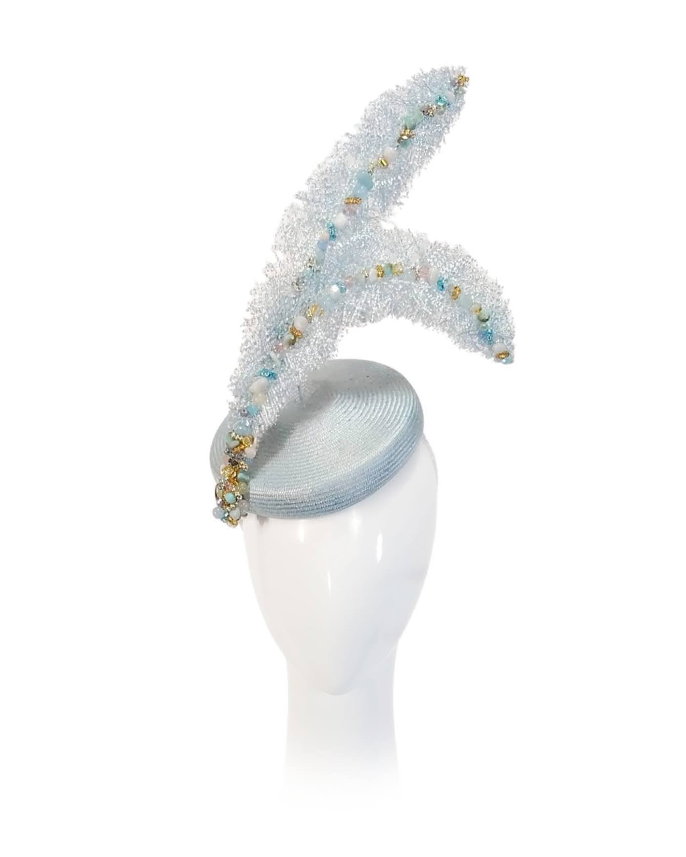 Australian milliner Kathryn Lee – It Girl Azura Sky blue headpiece featuring feather