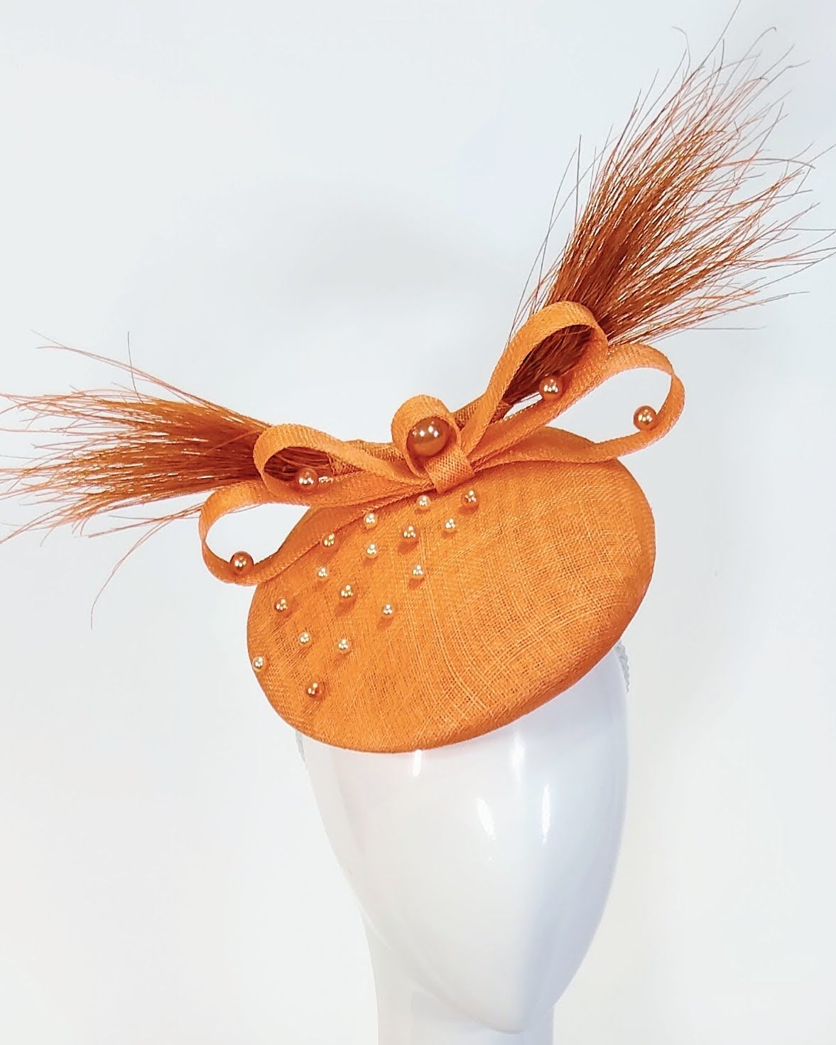 It Girl Kitsu by Kathryn Lee Millinery – bespoke Tangerine headpiece for Royal Randwick