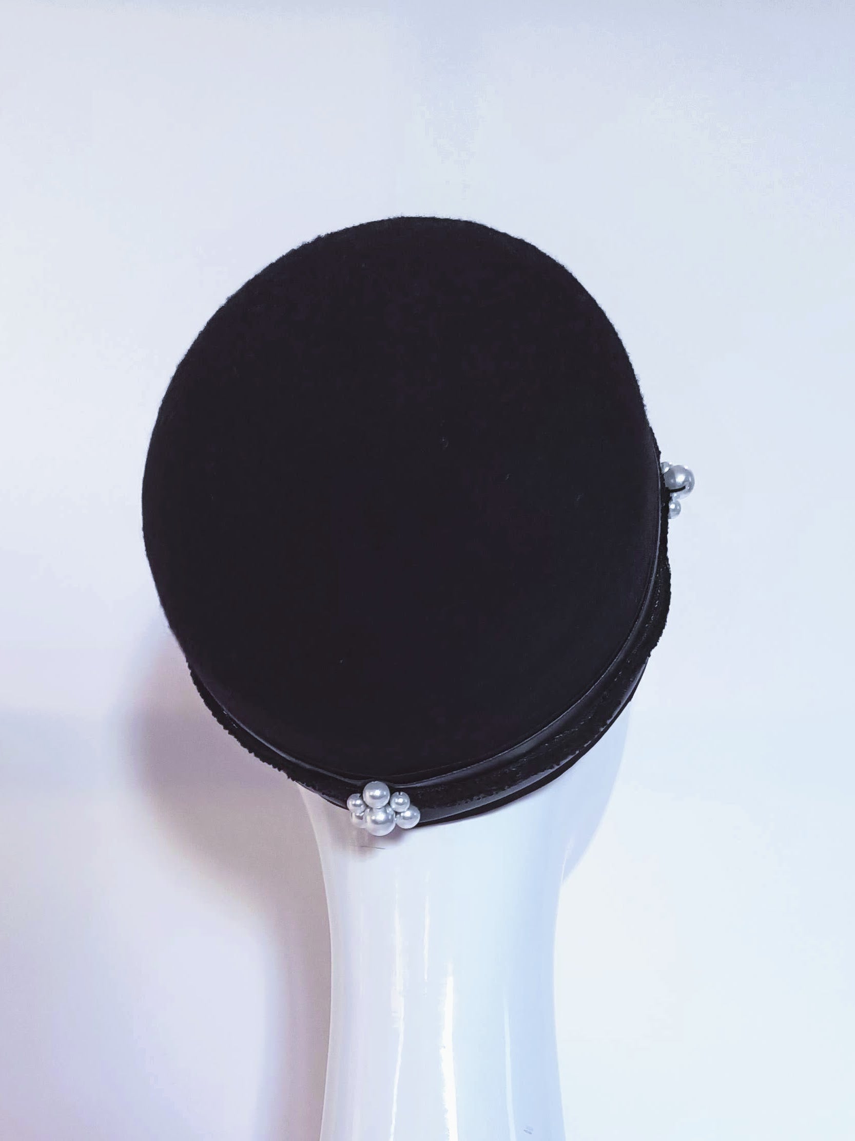 Black pillbox hat Jackie O featuring felt and leather – handmade in Sydney by Kathryn Lee