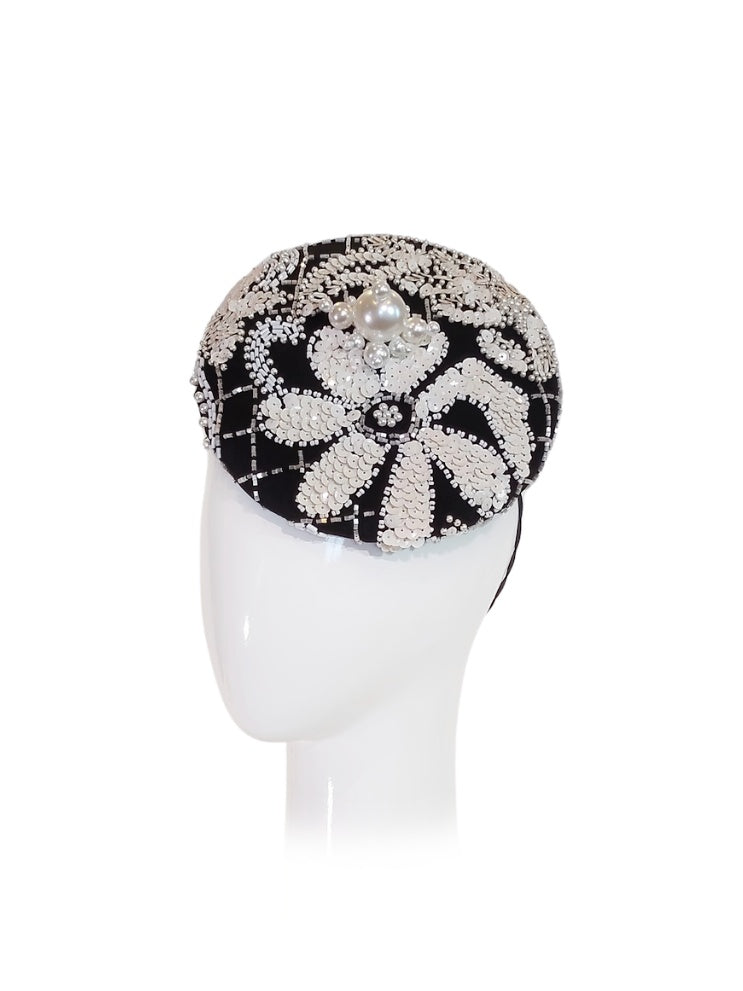 Miss YSL – cap crafted from pearl and crystal perfect for polo