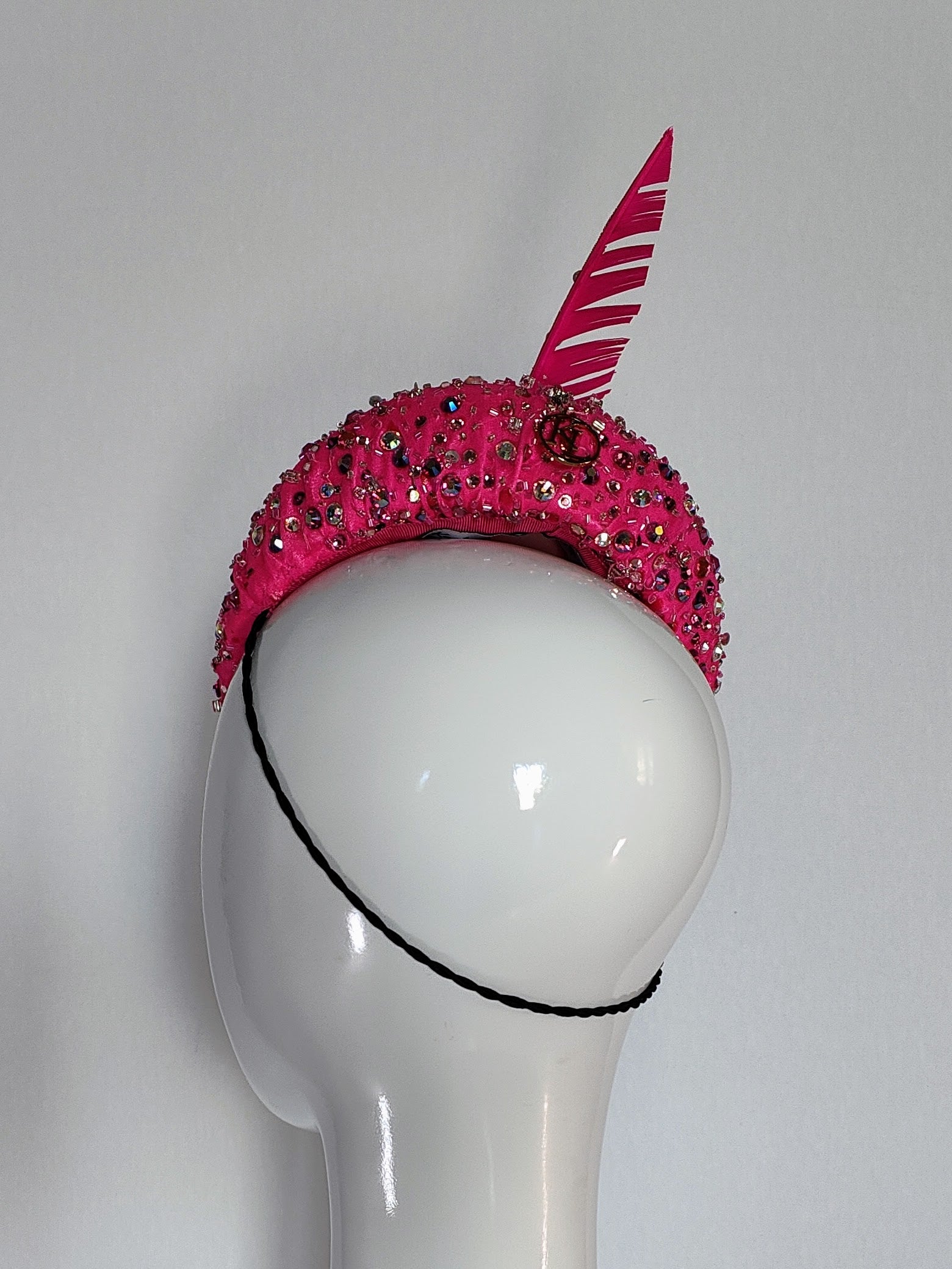 Bespoke Paulini cap crafted from feather – designed for garden party by Kathryn Lee