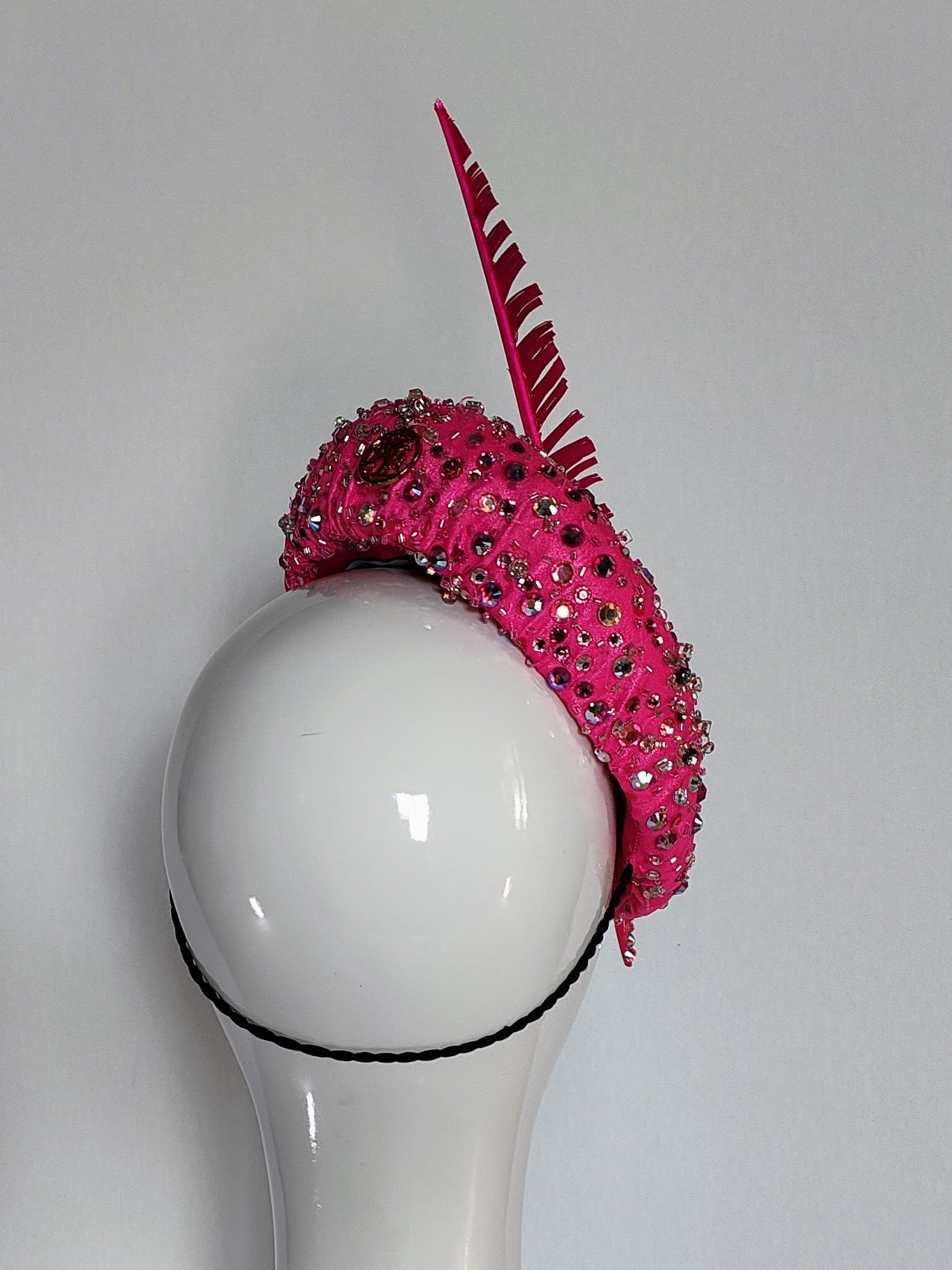 Kathryn Lee Millinery Paulini cap featuring feather – Australian couture headwear