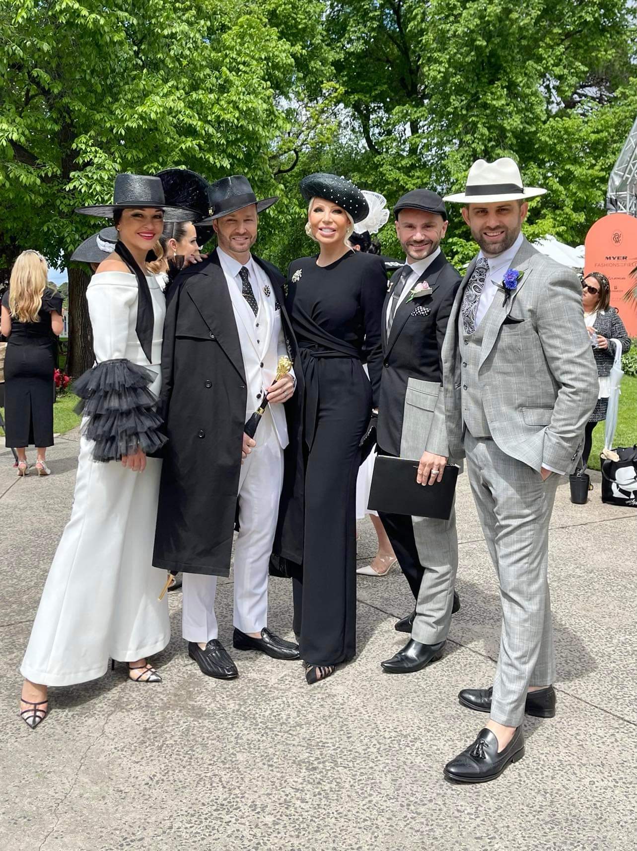Racing carnival fashion featuring handcrafted hat by Kathryn Lee Millinery on client