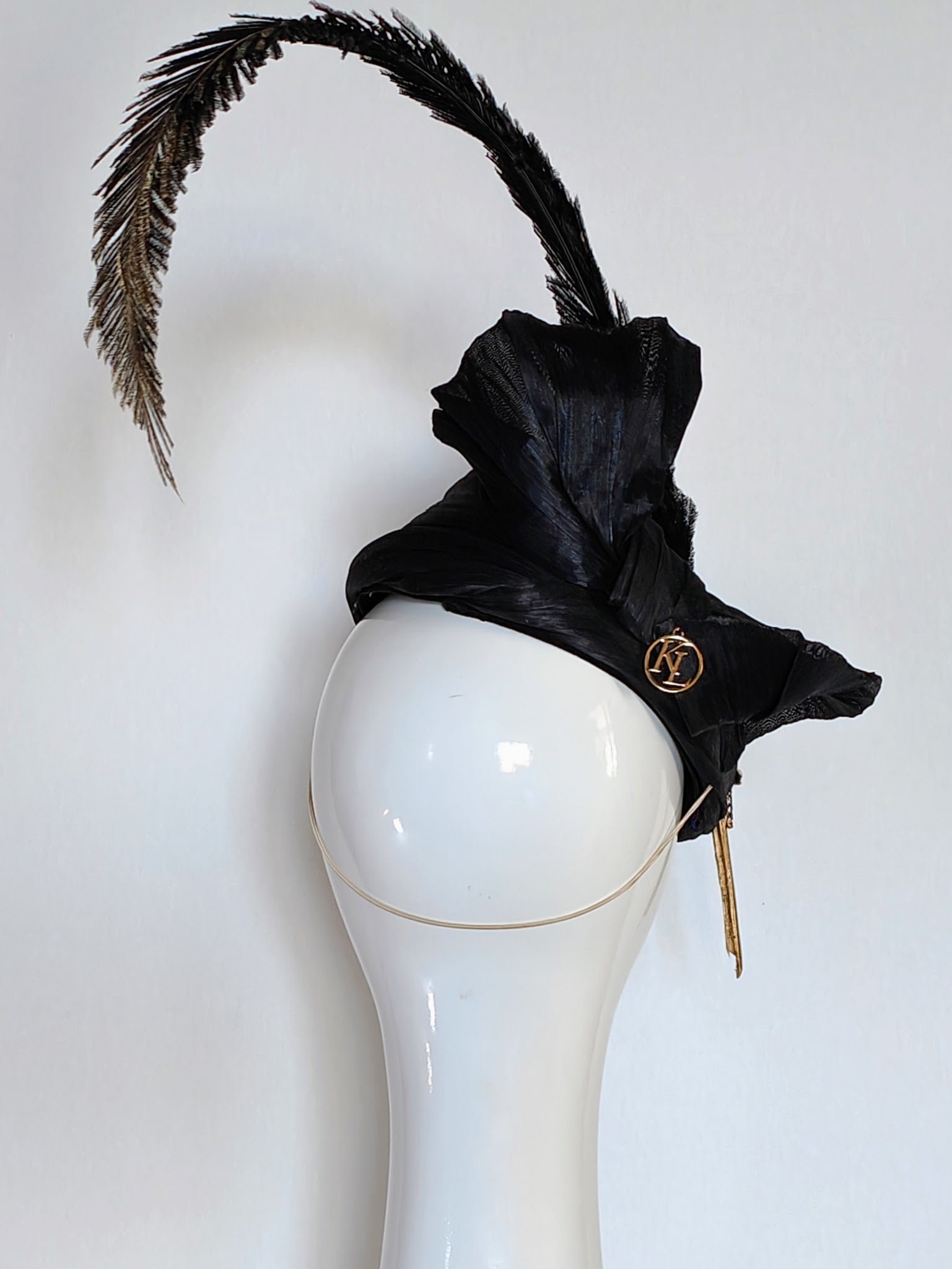 Black hat Sabrina featuring silk and feather – handmade in Sydney by Kathryn Lee