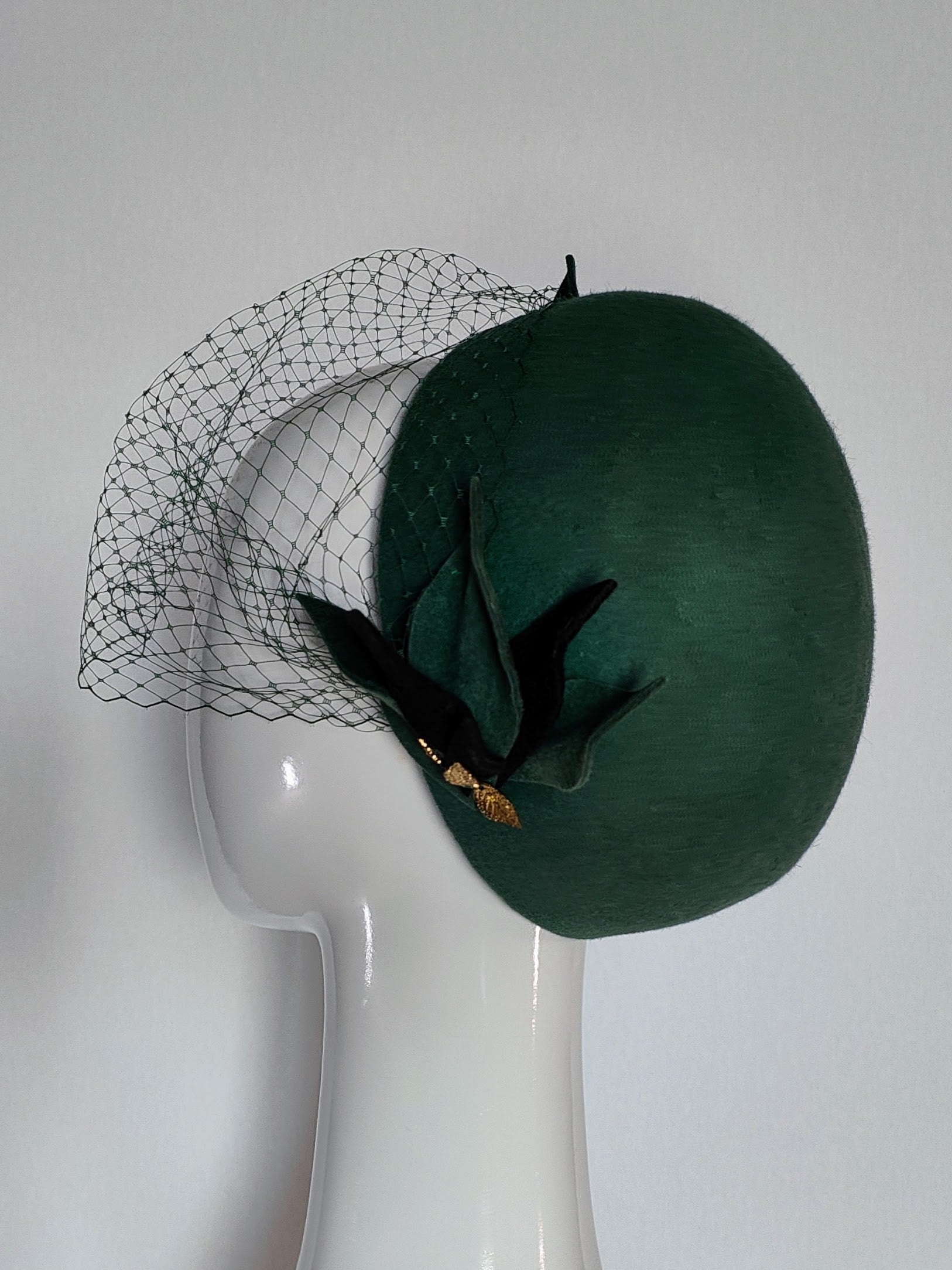 Green pillbox hat Yvonne featuring felt – handmade in Sydney by Kathryn Lee