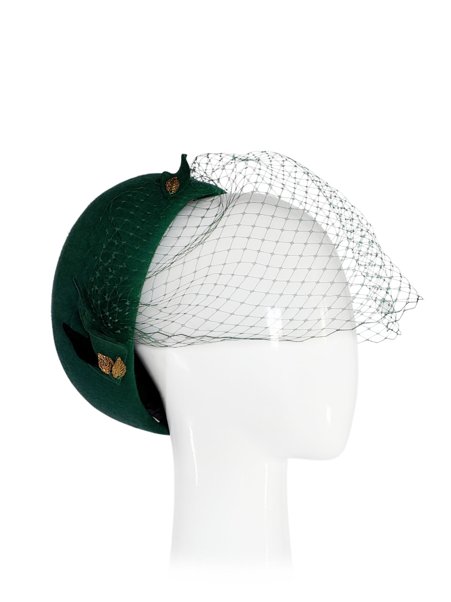 Green Yvonne pillbox hat crafted from felt – luxury racing headwear by Kathryn Lee