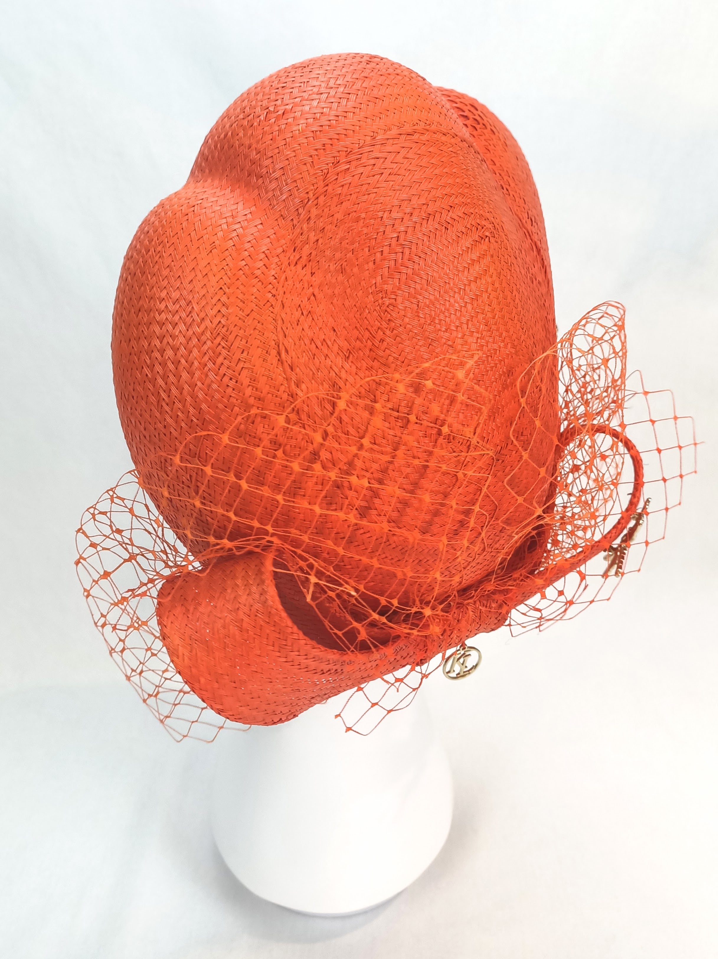 Tangerine Amalie beret crafted from straw – luxury racing headwear by Kathryn Lee