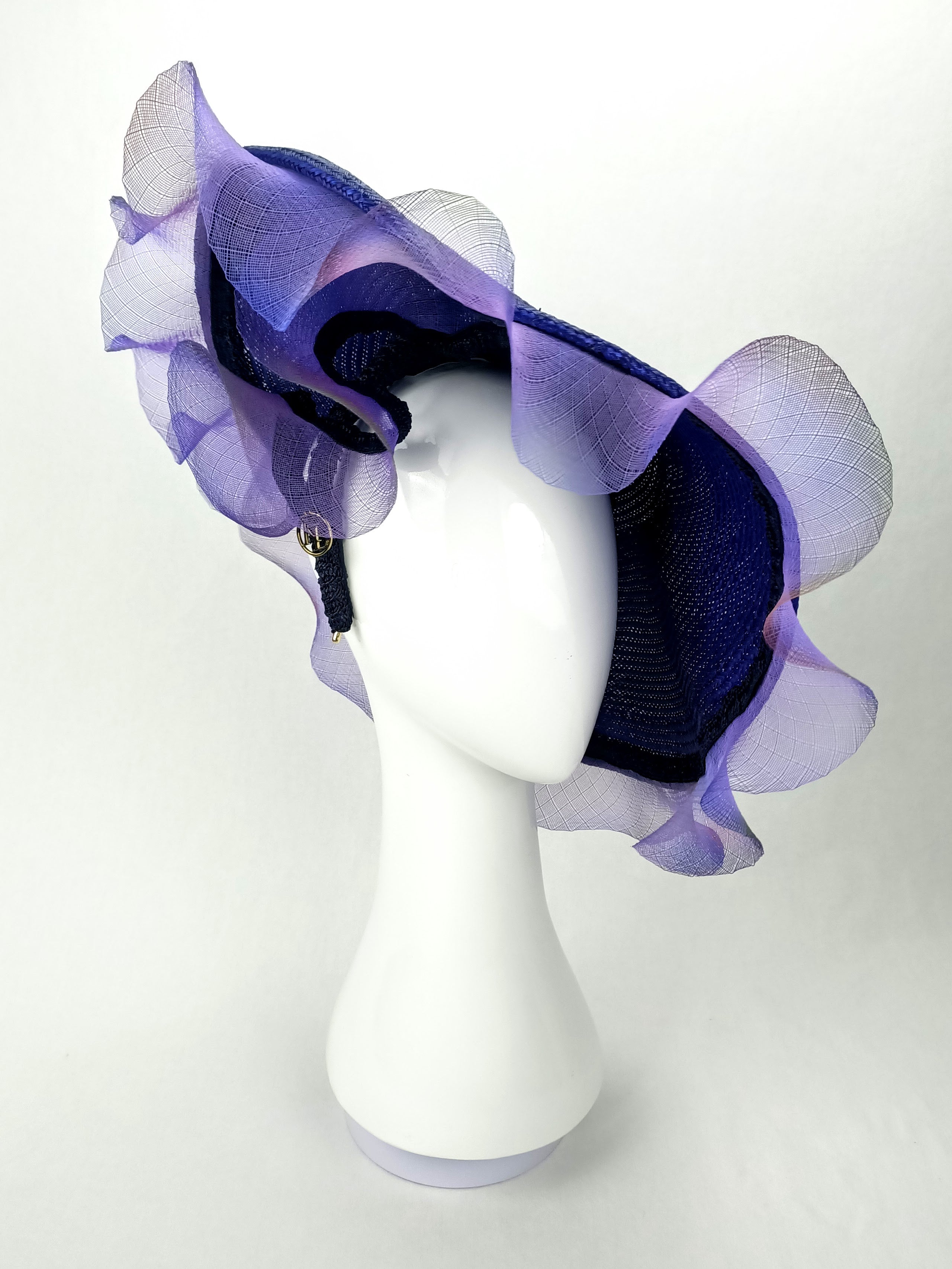 Amethyst hat – artisan millinery featuring straw for Dubai World Cup and beyond