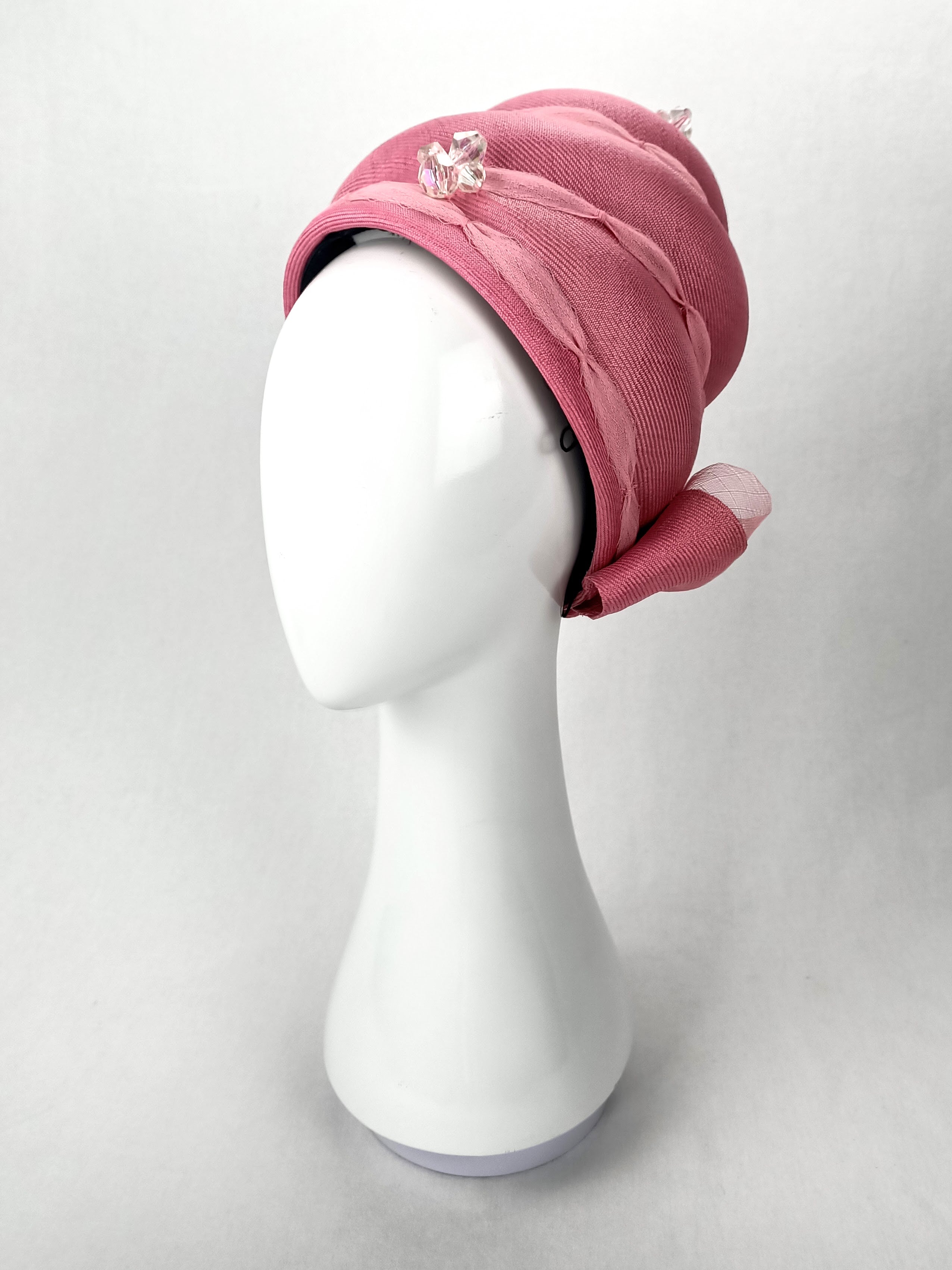April – Pink pillbox hat crafted from sinamay perfect for polo