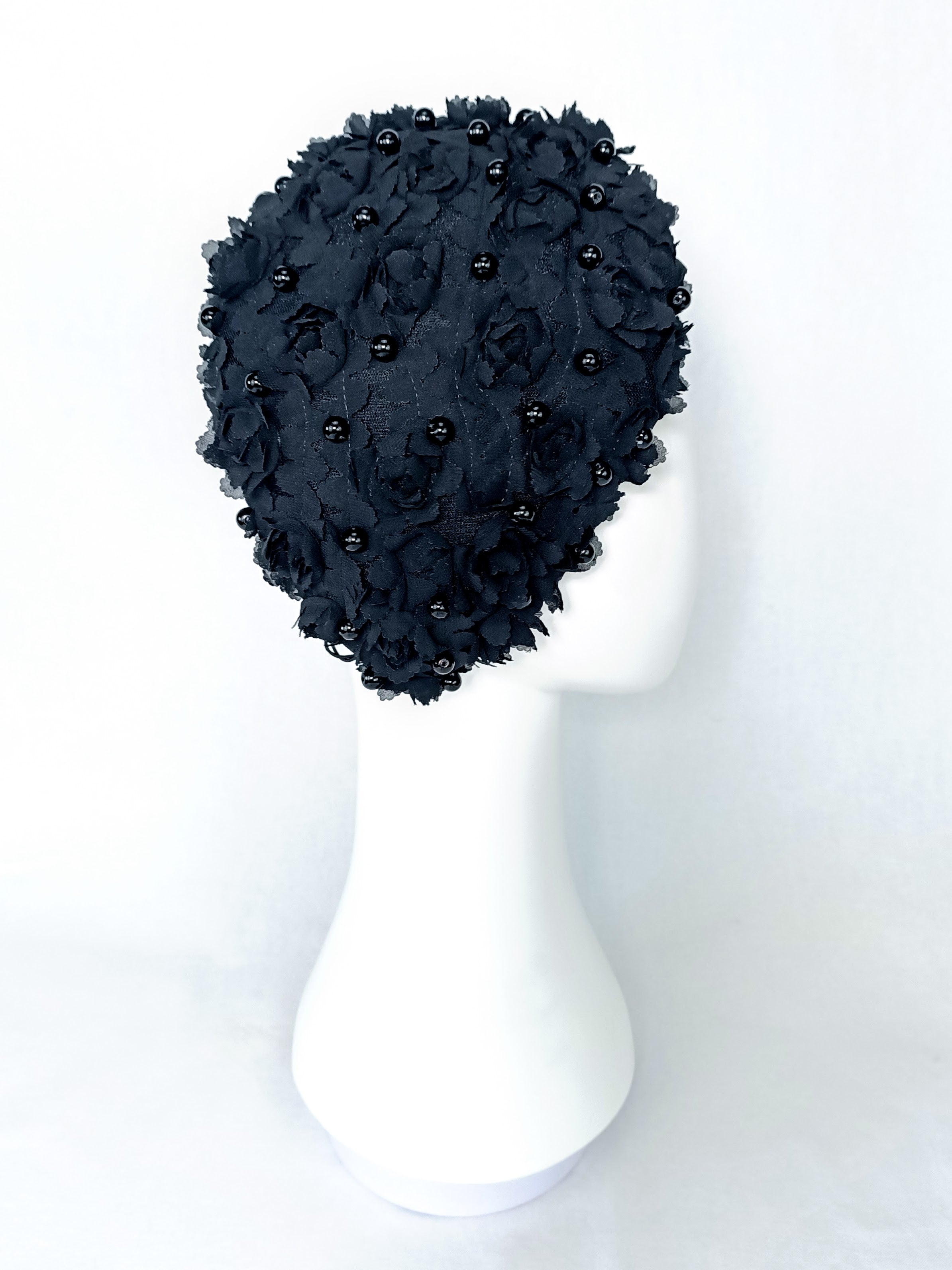 Black Pearl handcrafted fascinator crafted from silk and pearl – perfect for Flemington and garden party