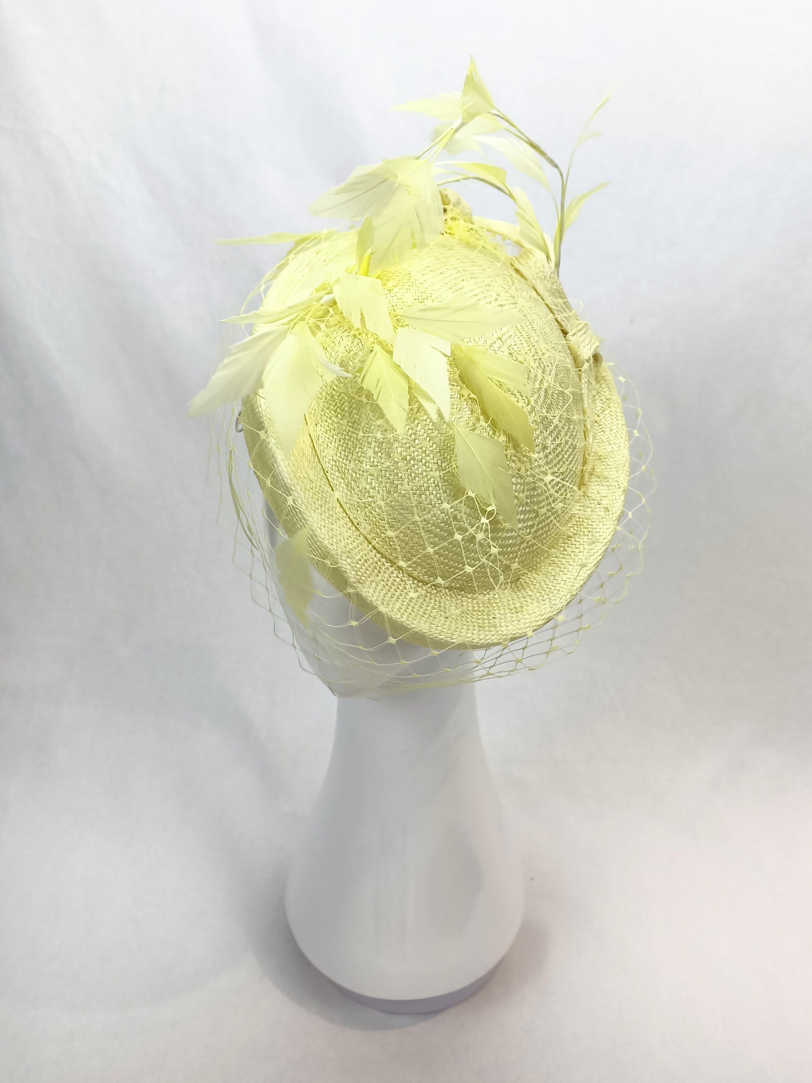 Yellow Diana beret crafted from sinamay and straw – luxury racing headwear by Kathryn Lee