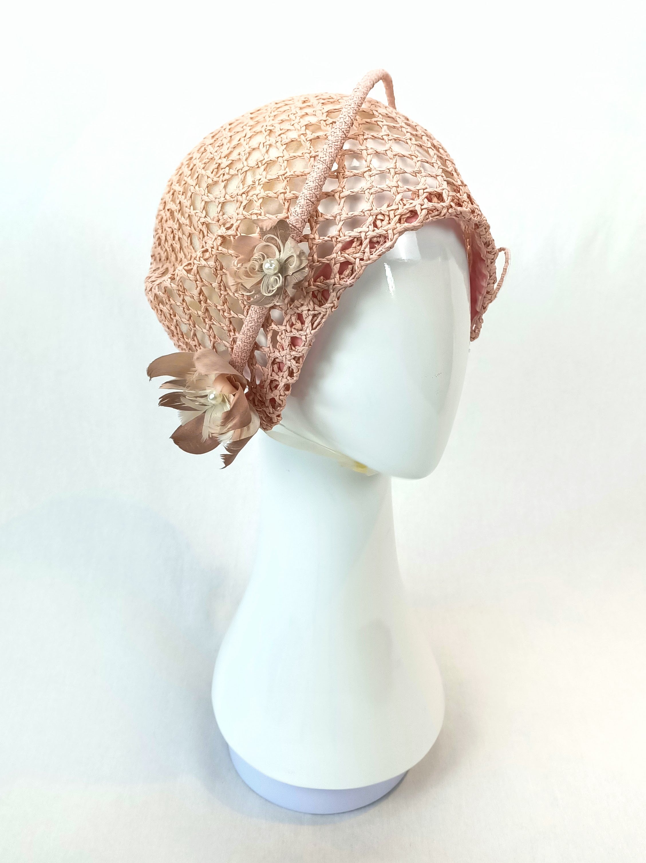 Millie cloche hat from the Kathryn Lee Millinery collection featuring straw and feather