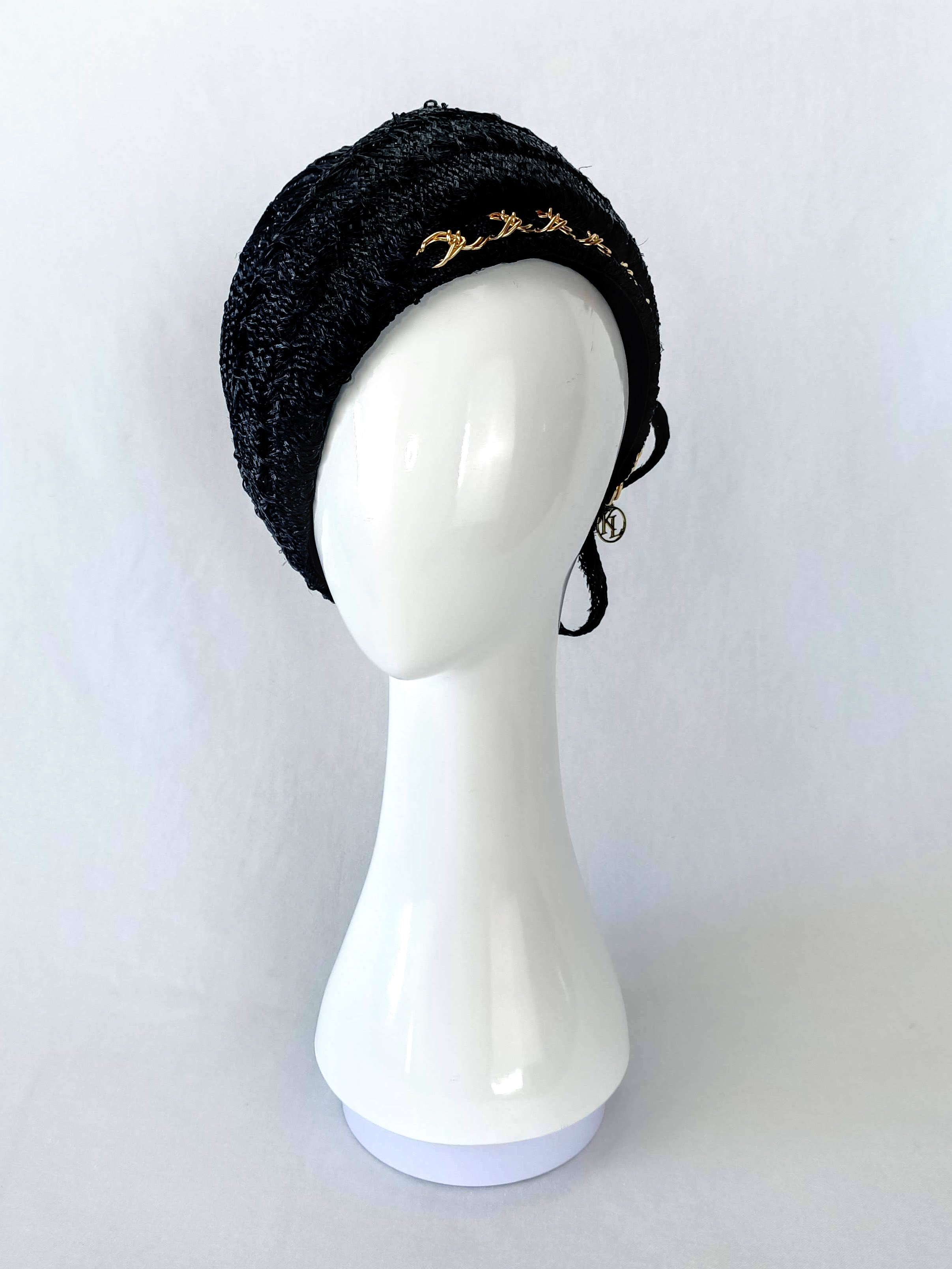 Olga – Black hat crafted from straw perfect for Royal Randwick