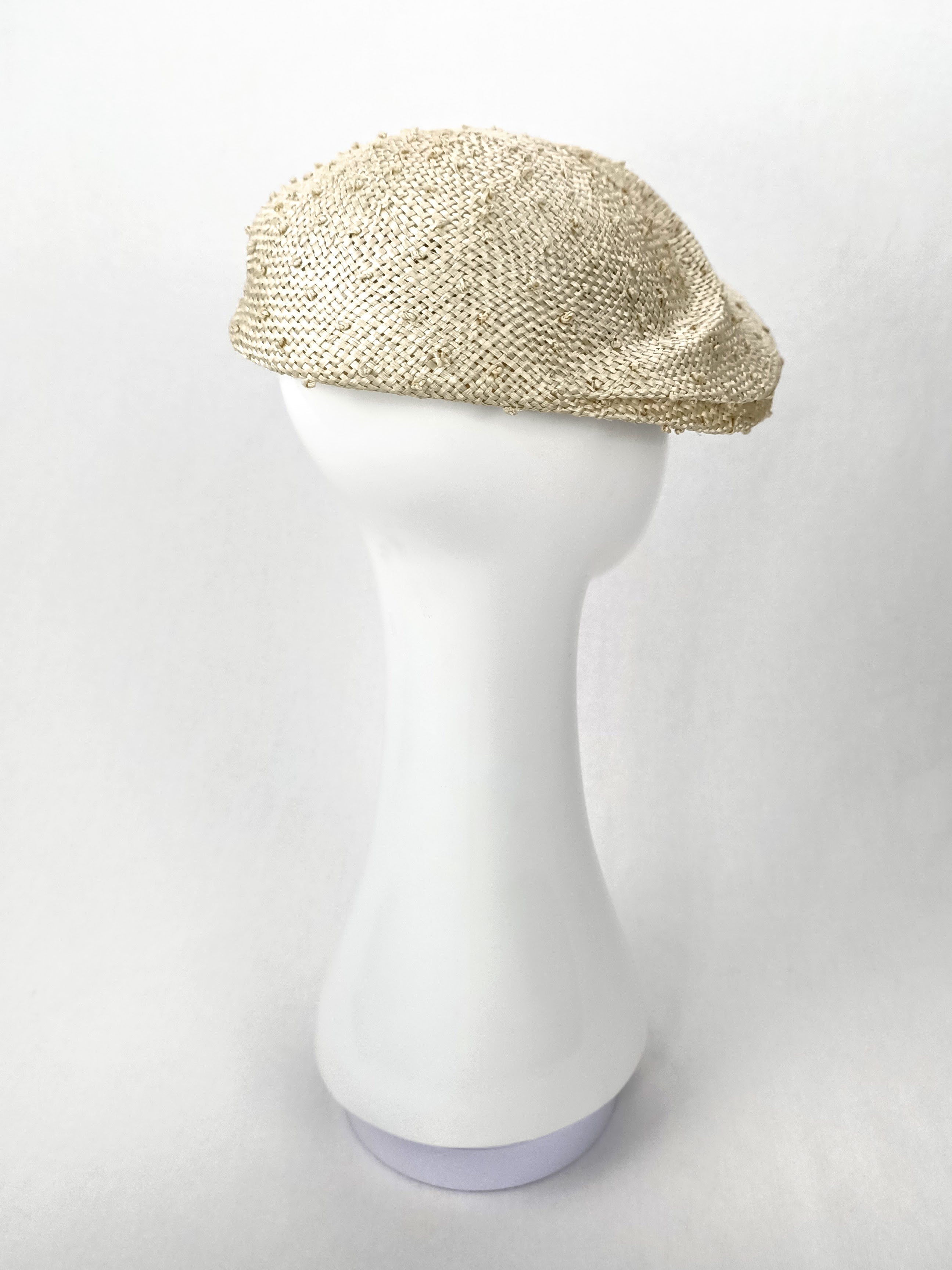 Cream Pearle cap crafted from straw and pearl – luxury racing headwear by Kathryn Lee
