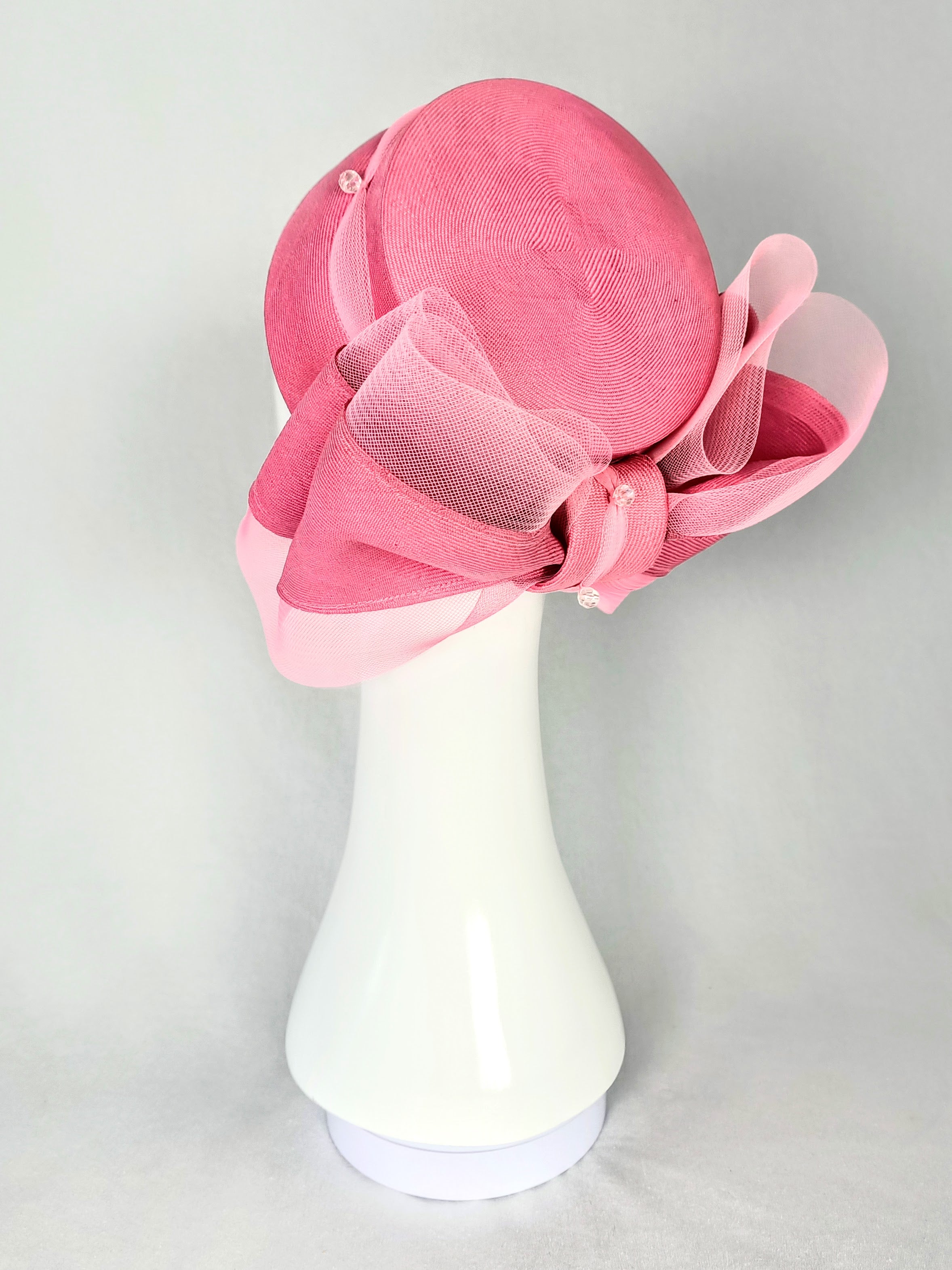 Rosalie – Pink pillbox hat crafted from straw and crystal perfect for fashions on the field
